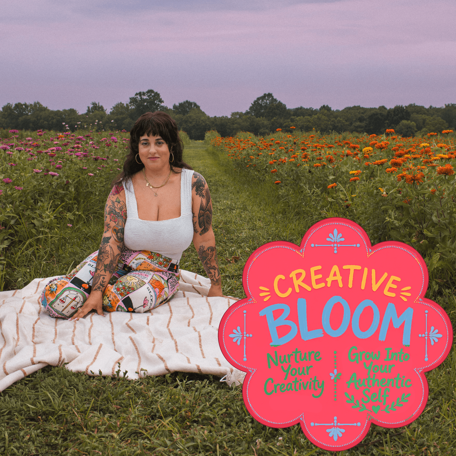 J.J. seated in a flower field beside a Creative Bloom sign.